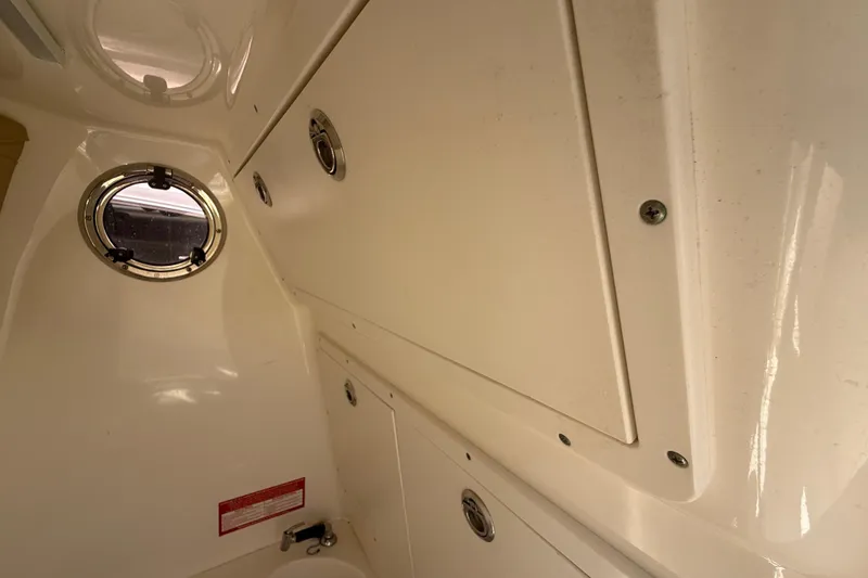 Slide: The Image of Interior cabin view of 2019 Key West Billistic 281 Center Console boat. - 106