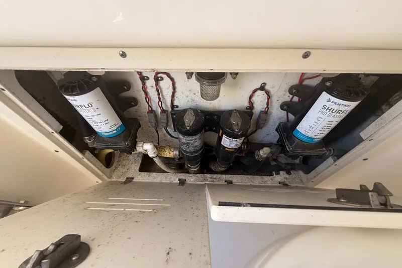 Slide: The Image of 2019 Key West Billistic 281 Center Console boat's pump system with Shurflo components. - 114