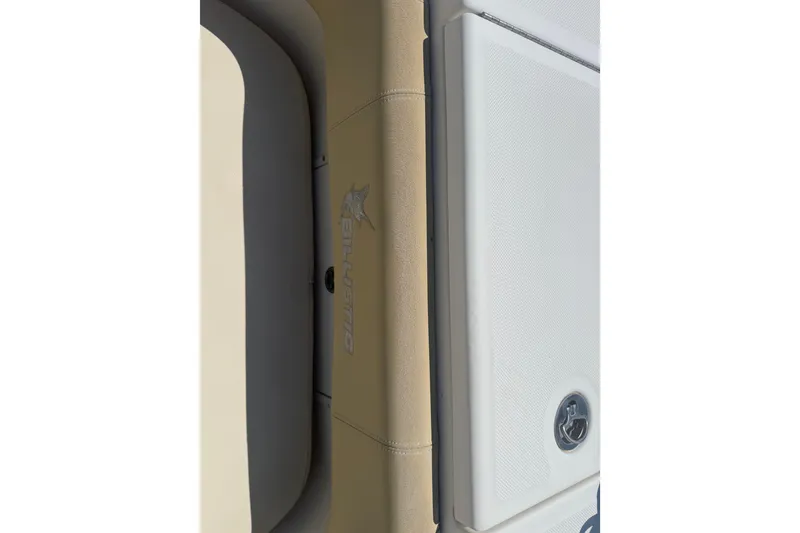 Slide: The Image of 2019 Key West Billistic 281 Center Console interior detail with logo and seating. - 116