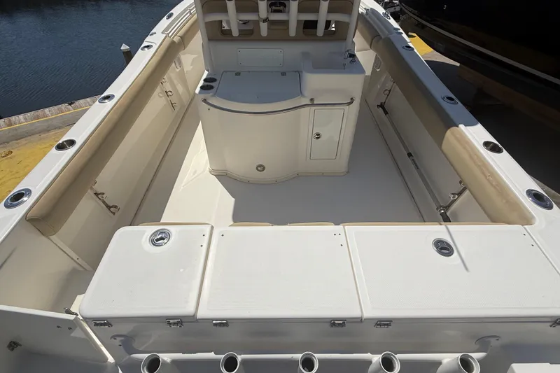 Slide: The Image of 2019 Key West Billistic 281 Center Console boat interior with spacious deck and seating. - 27