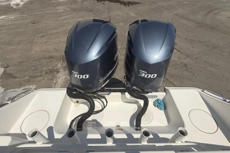 Slide: The Image of 2019 Key West Billistic 281 Center Console with twin Yamaha 300 engines. - 28