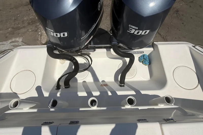 Slide: The Image of 2019 Key West Billistic 281 Center Console with twin Yamaha 300 engines. - 29