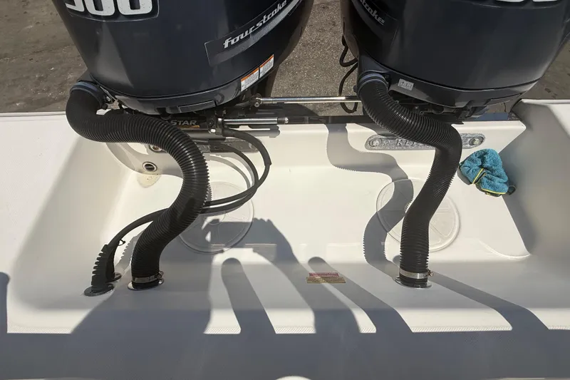 Slide: The Image of 2019 Key West Billistic 281 Center Console with dual outboard motors. - 30