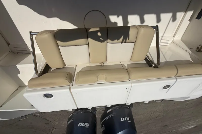 Slide: The Image of 2019 Key West Billistic 281 Center Console boat seating and dual Yamaha 300 engines. - 32