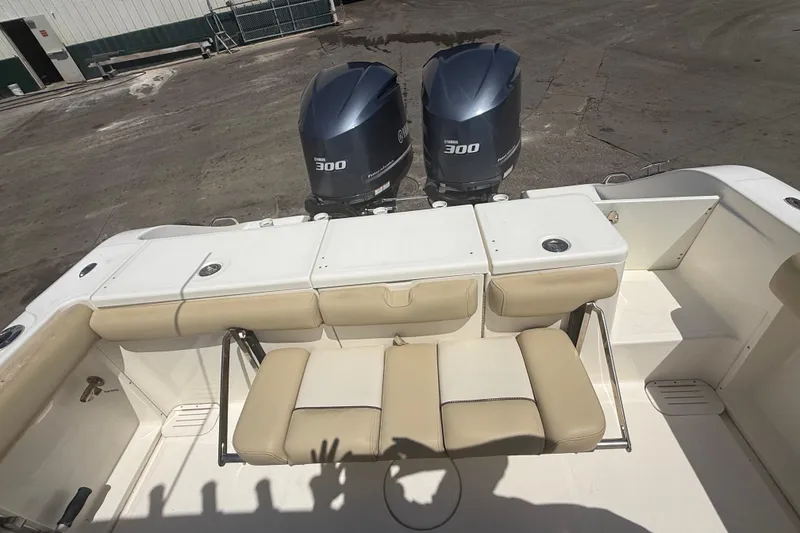 Slide: The Image of 2019 Key West Billistic 281 Center Console with twin Yamaha 300 engines, beige seating. - 33