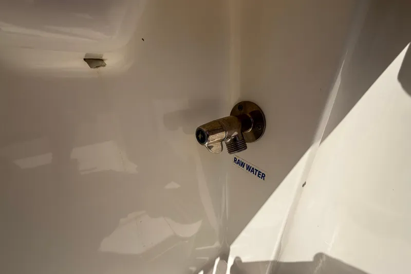Slide: The Image of Raw water outlet on 2019 Key West Billistic 281 Center Console boat. - 43