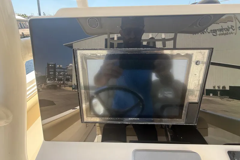 Slide: The Image of 2019 Key West Billistic 281 Center Console with Garmin GPS display. - 52