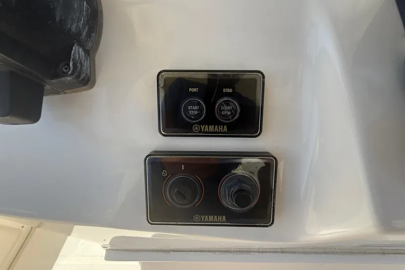 Slide: The Image of Yamaha controls on 2019 Key West Billistic 281 Center Console boat dashboard. - 55