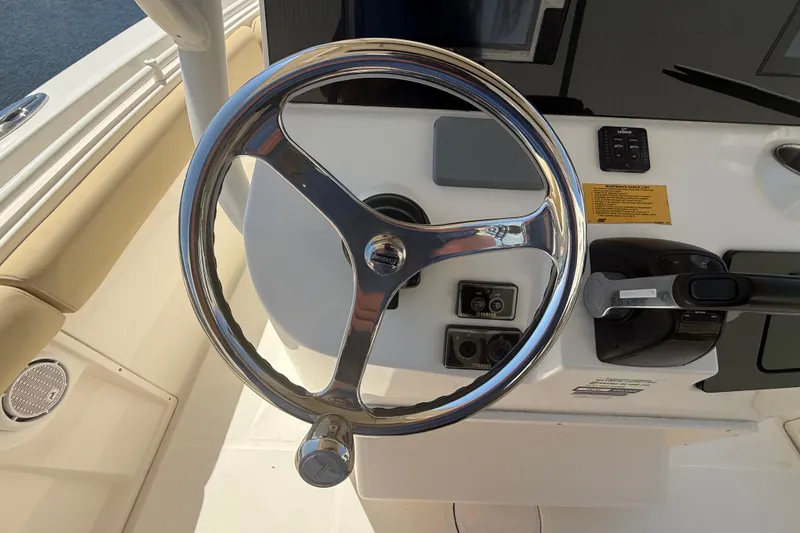 Slide: The Image of Steering wheel of 2019 Key West Billistic 281 Center Console boat. - 56