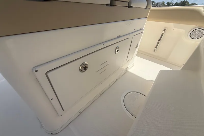 Slide: The Image of 2019 Key West Billistic 281 Center Console interior storage compartment. - 61
