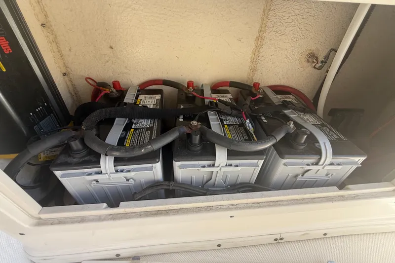 Slide: The Image of Batteries in a 2019 Key West Billistic 281 Center Console boat compartment. - 62