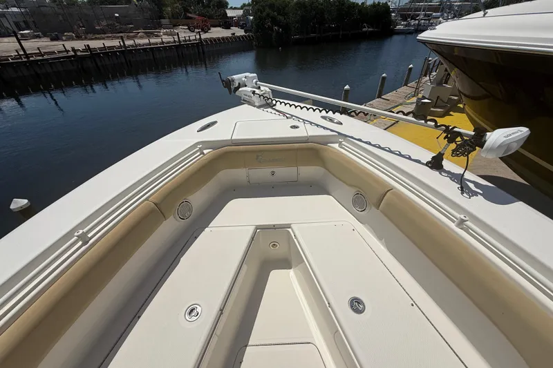 Slide: The Image of 2019 Key West Billistic 281 Center Console boat interior at dockside. - 81