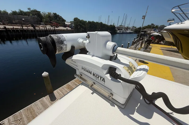 Slide: The Image of Minn Kota motor on 2019 Key West Billistic 281 Center Console at dock. - 83