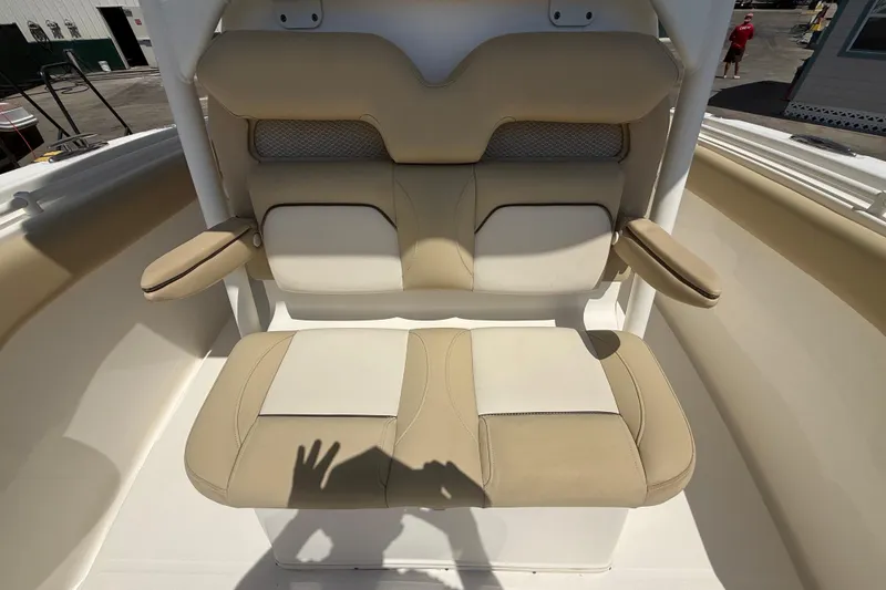 Slide: The Image of 2019 Key West Billistic 281 Center Console boat seat with beige and white upholstery. - 88