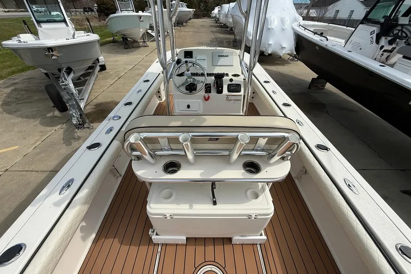 Slide: The Image of 2020 Carolina Skiff 26 Ultra Elite boat interior with helm and seating area. - 17