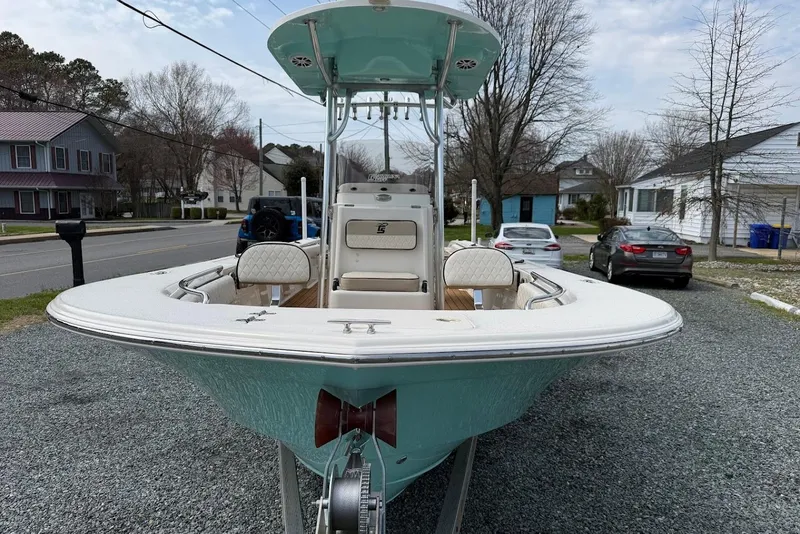 Slide: The Image of 2020 Carolina Skiff 26 Ultra Elite boat parked on a residential street. - 7
