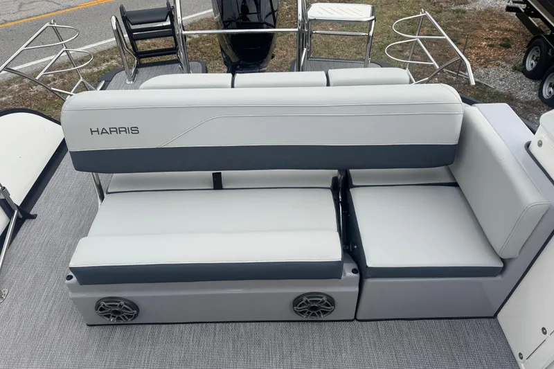 Slide: The Image of 2026 Harris Grand Mariner 250 SLDH boat seating with sleek design and integrated speakers. - 8