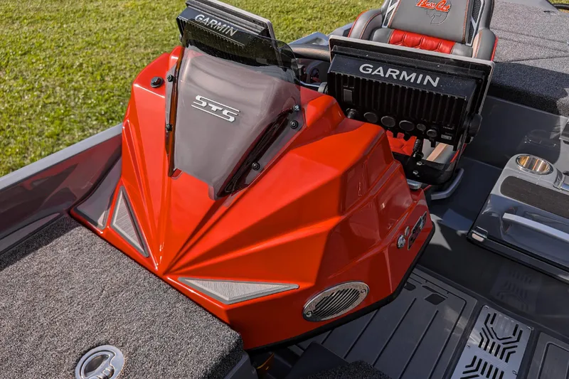 Slide: The Image of 2026 Bass Cat Lynx STS boat with Garmin electronics, featuring a sleek red console design. - 22