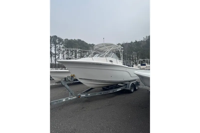 The Image of 2007 Sea Fox 236 Walk Around boat on trailer, parked outdoors. - 0