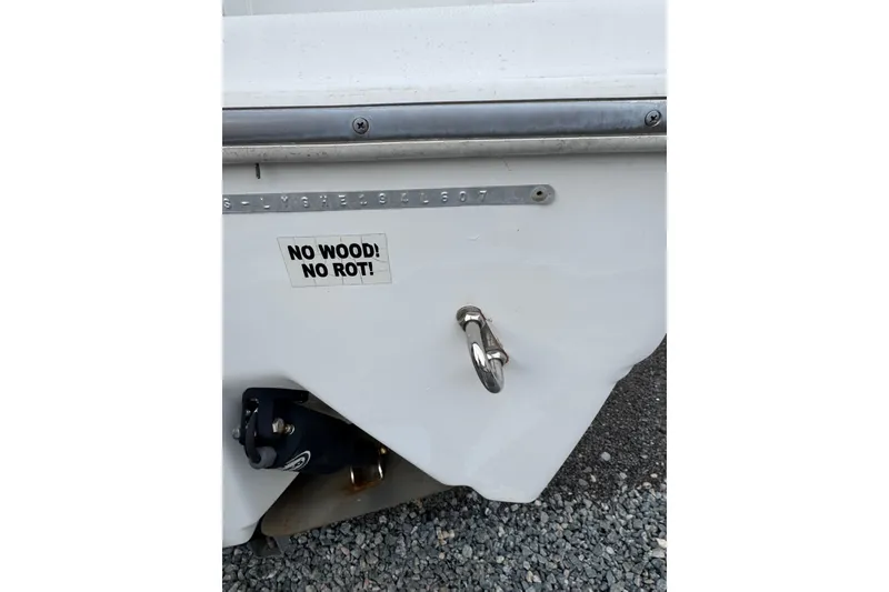 Slide: The Image of 2007 Sea Fox 236 Walk Around boat stern with "No Wood! No Rot!" sticker. - 3