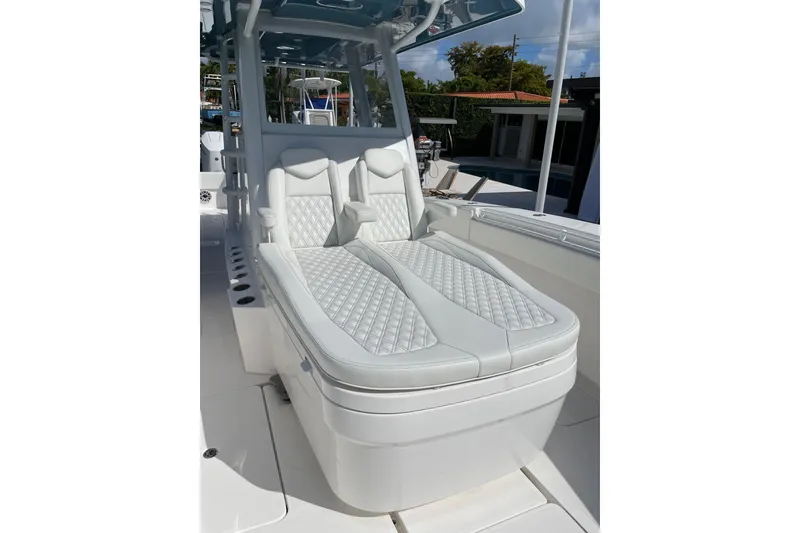 Slide: The Image of 2024 Invincible 36 Open Fisherman boat with luxurious white seating and sleek design. - 29