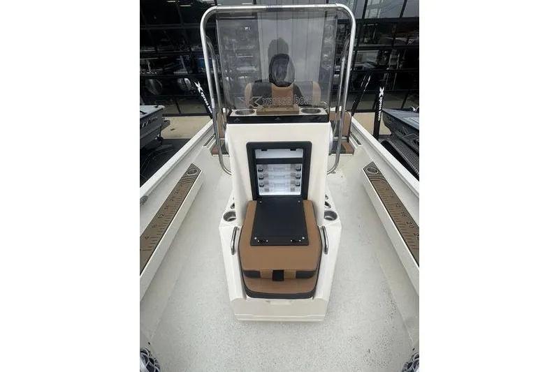 Slide: The Image of 2026 Xpress H22 boat interior with seating and storage compartment. - 13