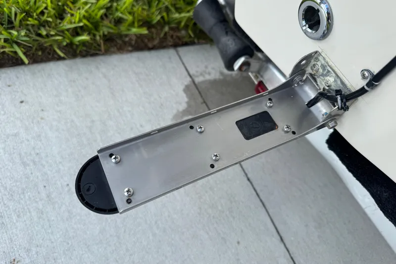 Slide: The Image of Transom mount on a 2022 Carolina Skiff 19 LS boat, featuring stainless steel hardware. - 13