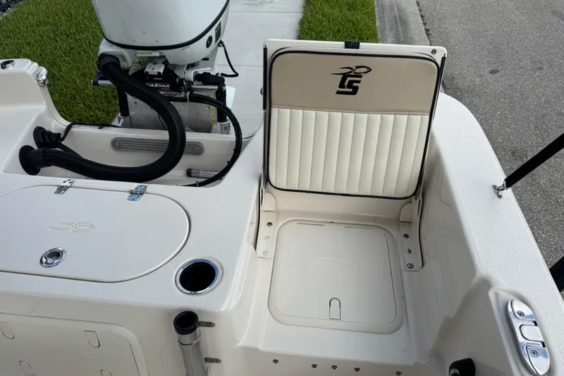 Slide: The Image of 2022 Carolina Skiff 19 LS boat interior with seating and motor details. - 27