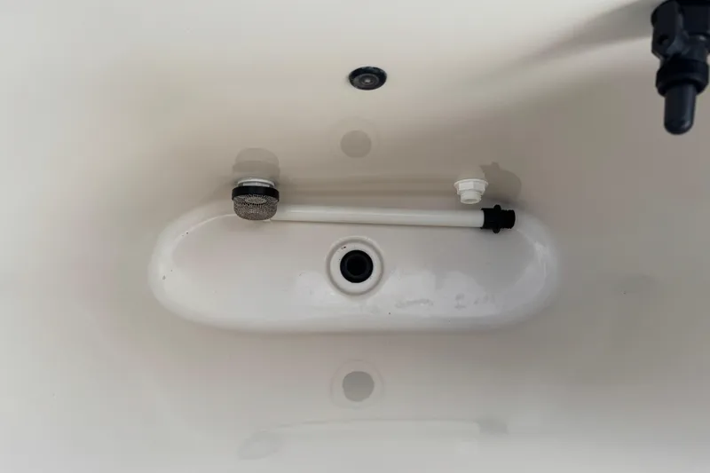 Slide: The Image of Interior view of a 2022 Carolina Skiff 19 LS boat compartment. - 32