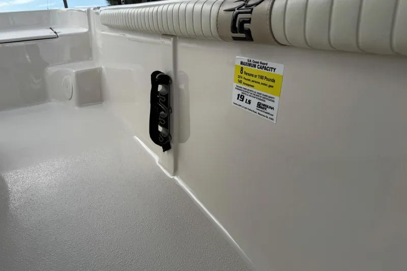 Slide: The Image of 2022 Carolina Skiff 19 LS boat interior with capacity label and seating detail. - 33