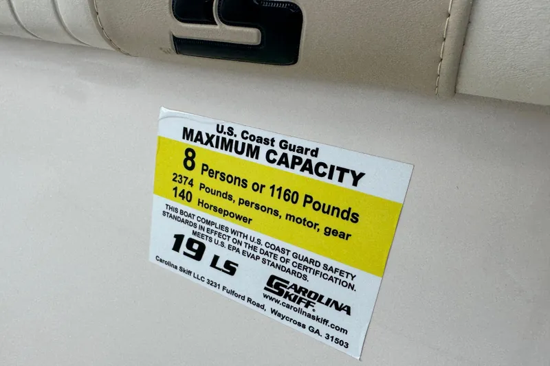 Slide: The Image of 2022 Carolina Skiff 19 LS capacity label, 8 persons or 1160 pounds, 140 horsepower. - 34