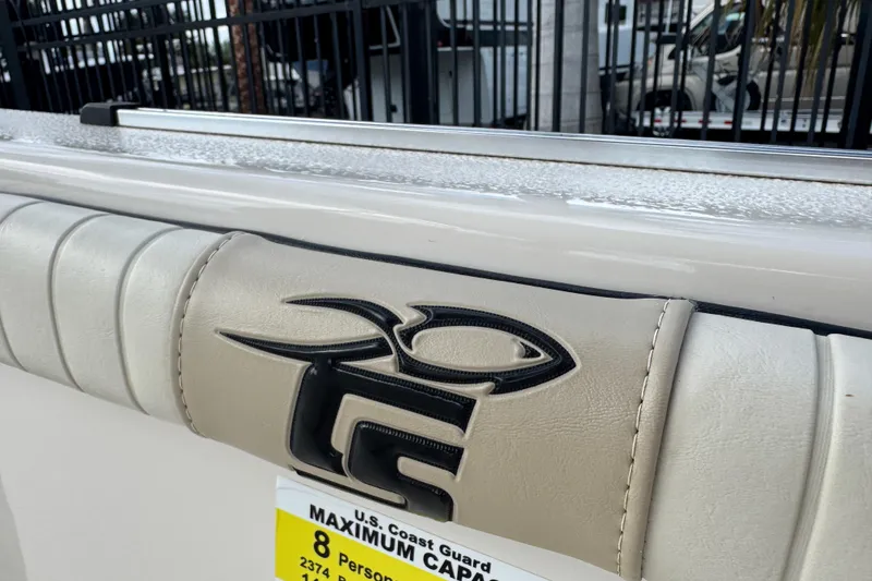 Slide: The Image of 2022 Carolina Skiff 19 LS boat interior with logo and capacity label. - 35