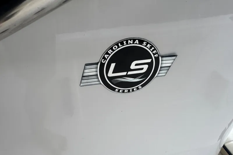 Slide: The Image of 2022 Carolina Skiff 19 LS logo on boat hull. - 36