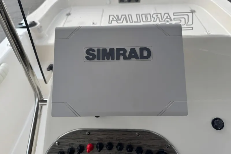 Slide: The Image of Simrad navigation system on 2022 Carolina Skiff 19 LS boat dashboard. - 38