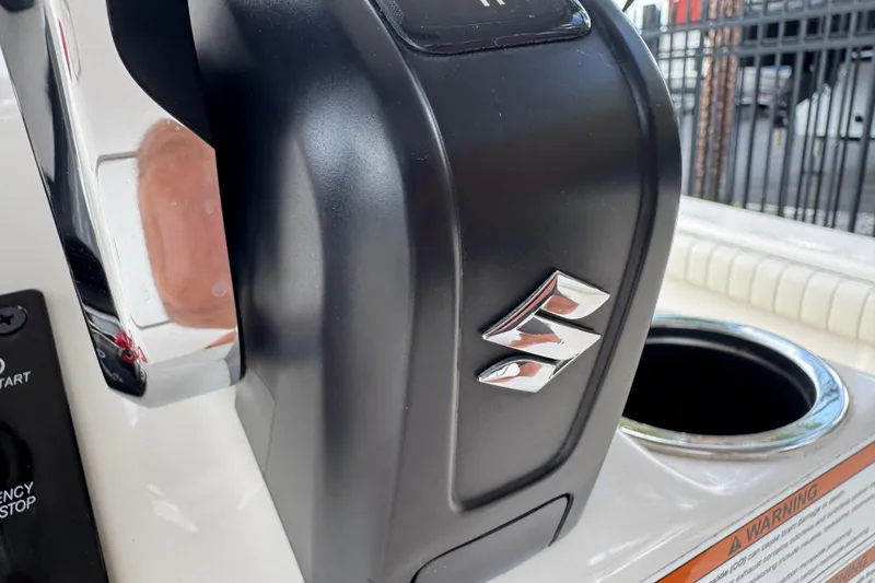 Slide: The Image of Close-up of Suzuki engine control on 2022 Carolina Skiff 19 LS boat. - 45