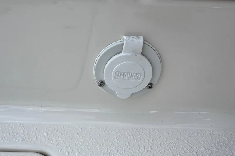 Slide: The Image of Marinco power inlet on 2022 Carolina Skiff 19 LS boat. - 57