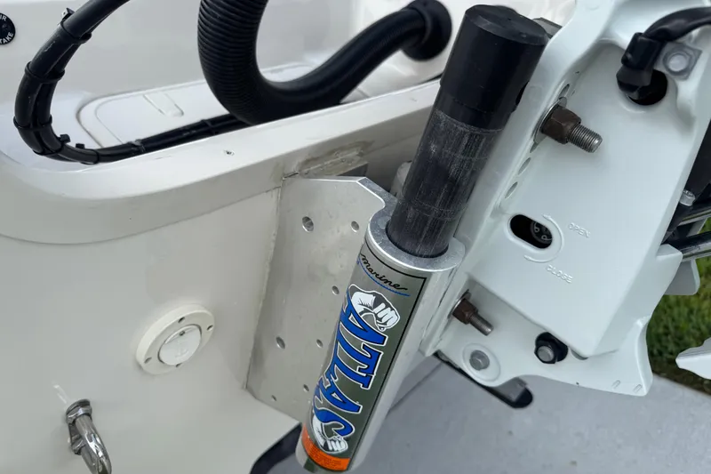 Slide: The Image of Close-up of a 2022 Carolina Skiff 19 LS boat's hydraulic steering system. - 7