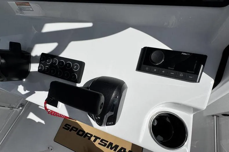 Slide: The Image of Control panel of 2026 Sportsman Heritage 231 Center Console boat with modern features. - 22