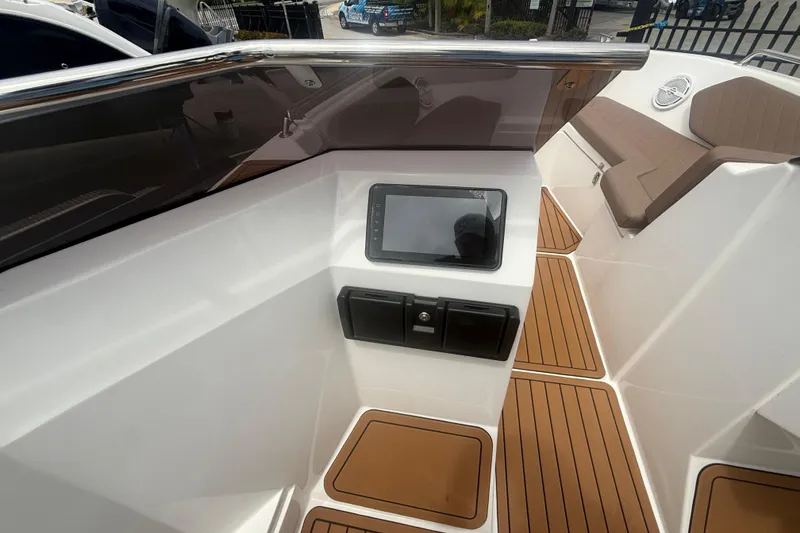 Slide: The Image of Modern 2025 Drive Wave 570 boat interior with sleek dashboard and comfortable seating. - 11