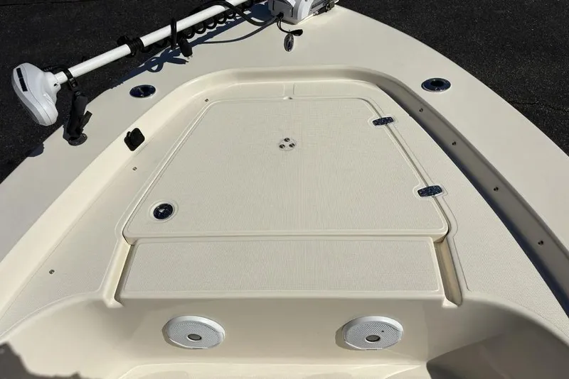 Slide: The Image of 2016 Scout 177 Sport boat deck with storage hatch and trolling motor. - 15