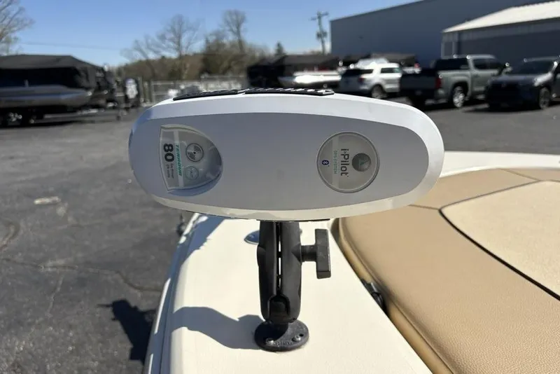 Slide: The Image of 2016 Scout 177 Sport boat with i-Pilot trolling motor in a parking lot. - 5