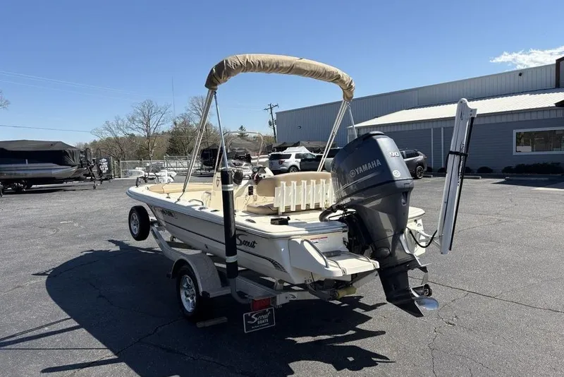 Slide: The Image of 2016 Scout 177 Sport boat with Yamaha engine, parked outdoors on a sunny day. - 6