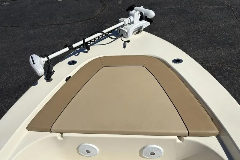 Slide: The Image of Bow of 2016 Scout 177 Sport boat with trolling motor and cushioned seating. - 9