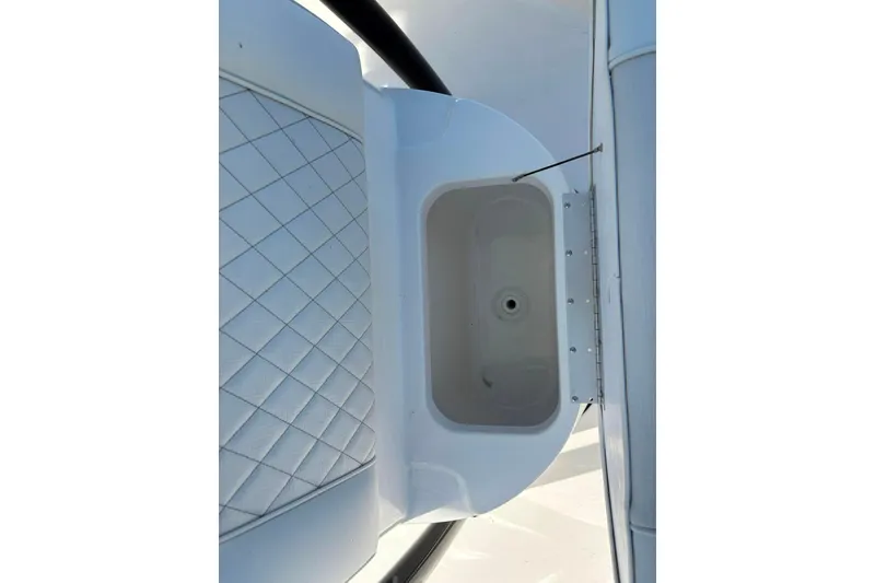 Slide: The Image of Interior view of 2026 Key West 230 Bay Reef boat, featuring a storage compartment. - 5