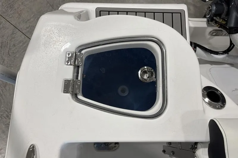 Slide: The Image of 2026 Tidewater 210 CC Adventure boat hatch with secure latch and sleek design. - 18