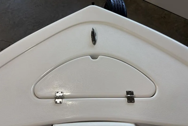 Slide: The Image of Bow storage compartment on a 2026 Tidewater 210 CC Adventure boat. - 2