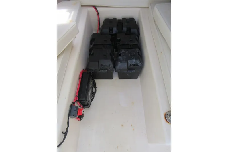 Slide: The Image of Battery compartment of a 2006 Parker 2120 Sport Cabin boat. - 37