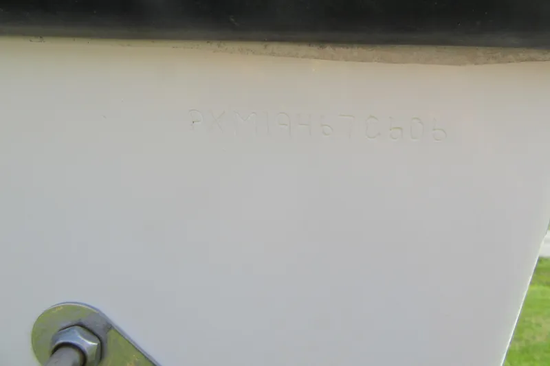 Slide: The Image of Hull identification number on 2006 Parker 2120 Sport Cabin boat. - 7