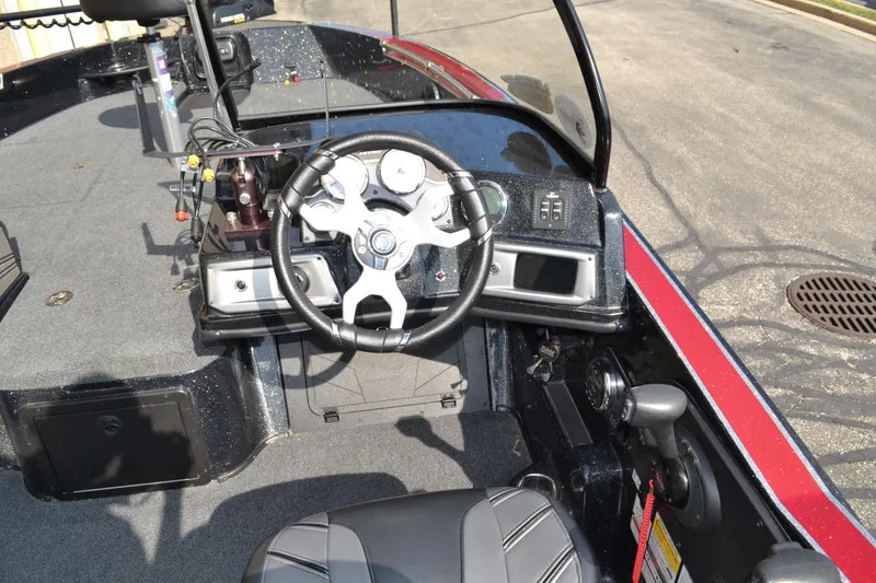 Slide: The Image of 2022 Nitro ZV20 boat cockpit with steering wheel and control panel. - 10