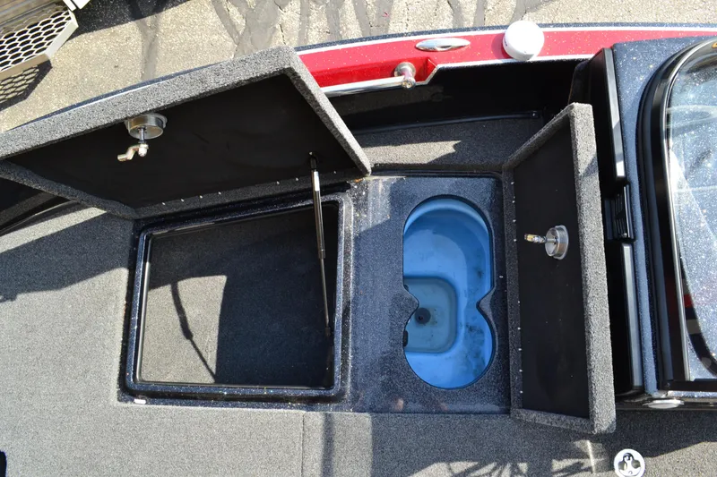 Slide: The Image of Open storage compartments on a 2022 Nitro ZV20 boat deck. - 20